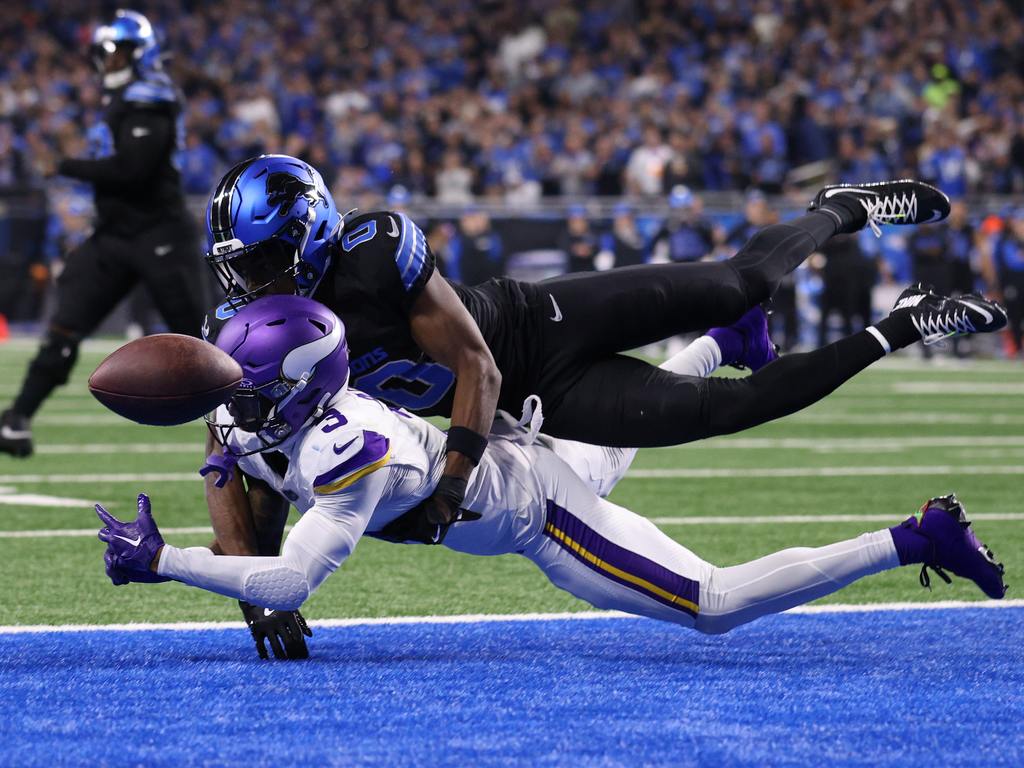 Terrion Arnold #0 of the Detroit Lions breaks up a pass intended for Jordan Addison #3 of the Minnesota Vikings during the third quarter at Ford Field on January 05, 2025 in Detroit, Michigan.