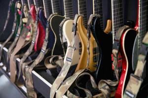 LAS VEGAS, NV - MAY 09: Electric guitars hang on display during Rock In Rio USA at the MGM Resorts Festival Grounds. Motor City Riffs