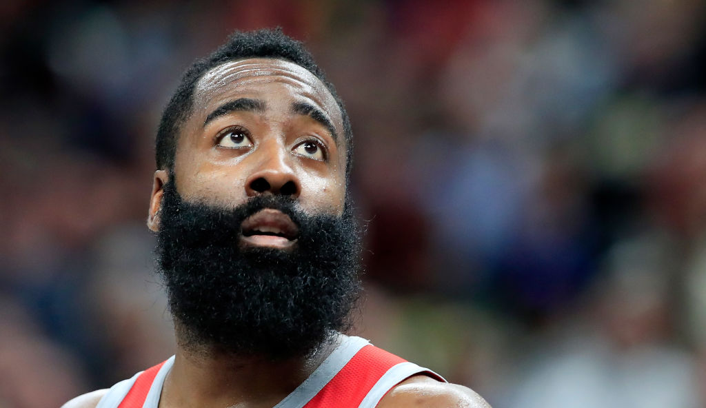 James Harden gets nailed in the face from an opposing players pass attempt