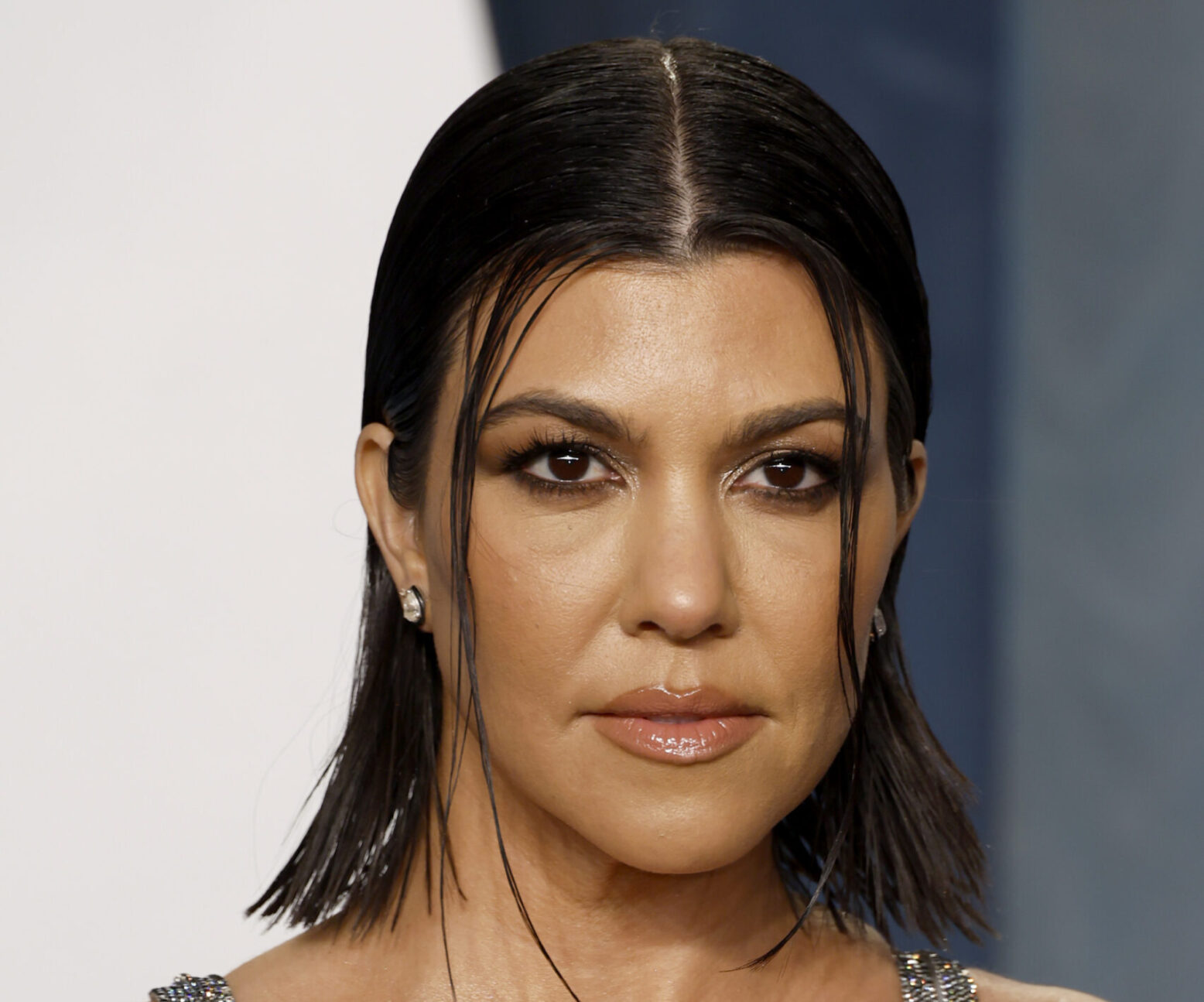 Kourtney Kardashian Claps Back At Fan Asking If She Is Pregnant 