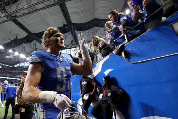 DETROIT, MICHIGAN - NOVEMBER 19: Aidan Hutchinson #97 of the Detroit Lions leaves the field after a game against the Chicago Bears at Ford Field on November 19, 2023 in Detroit, Michigan. (Photo by Gregory Shamus/Getty Images)