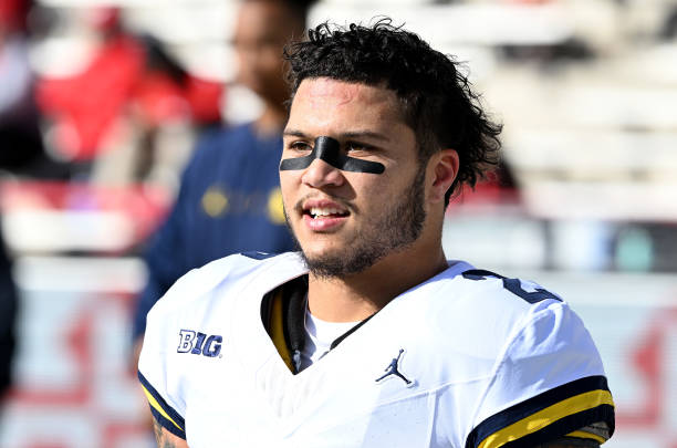 COLLEGE PARK, MARYLAND - NOVEMBER 18: Blake Corum #2 of the Michigan Wolverines warms up before the game against the Maryland Terrapins at SECU Stadium on November 18, 2023 in College Park, Maryland. 