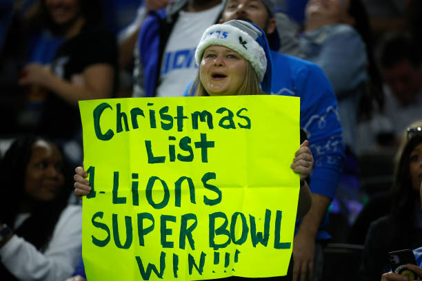 NEW ORLEANS, LOUISIANA - DECEMBER 03: A fan holds a sign during the game between the Detroit Lions and the New Orleans Saints at the Caesars Superdome on December 03, 2023 in New Orleans, Louisiana. (Photo by Chris Graythen/Getty Images)
