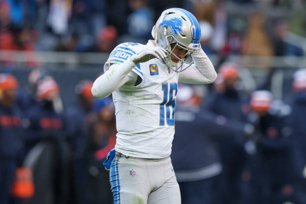 CHICAGO, IL - DECEMBER 10: Quarterback Jared Goff #16 of the Detroit Lions walks off the field during the second half of an NFL football game agains the Chicago Bears at Soldier Field on December 10, 2023 in Chicago, Illinois. The Bears beat the Lions 28-13. (Photo by Todd Rosenberg/Getty Images)